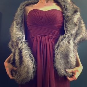 Wine strapless dress, faux fur wrap, gold earrings